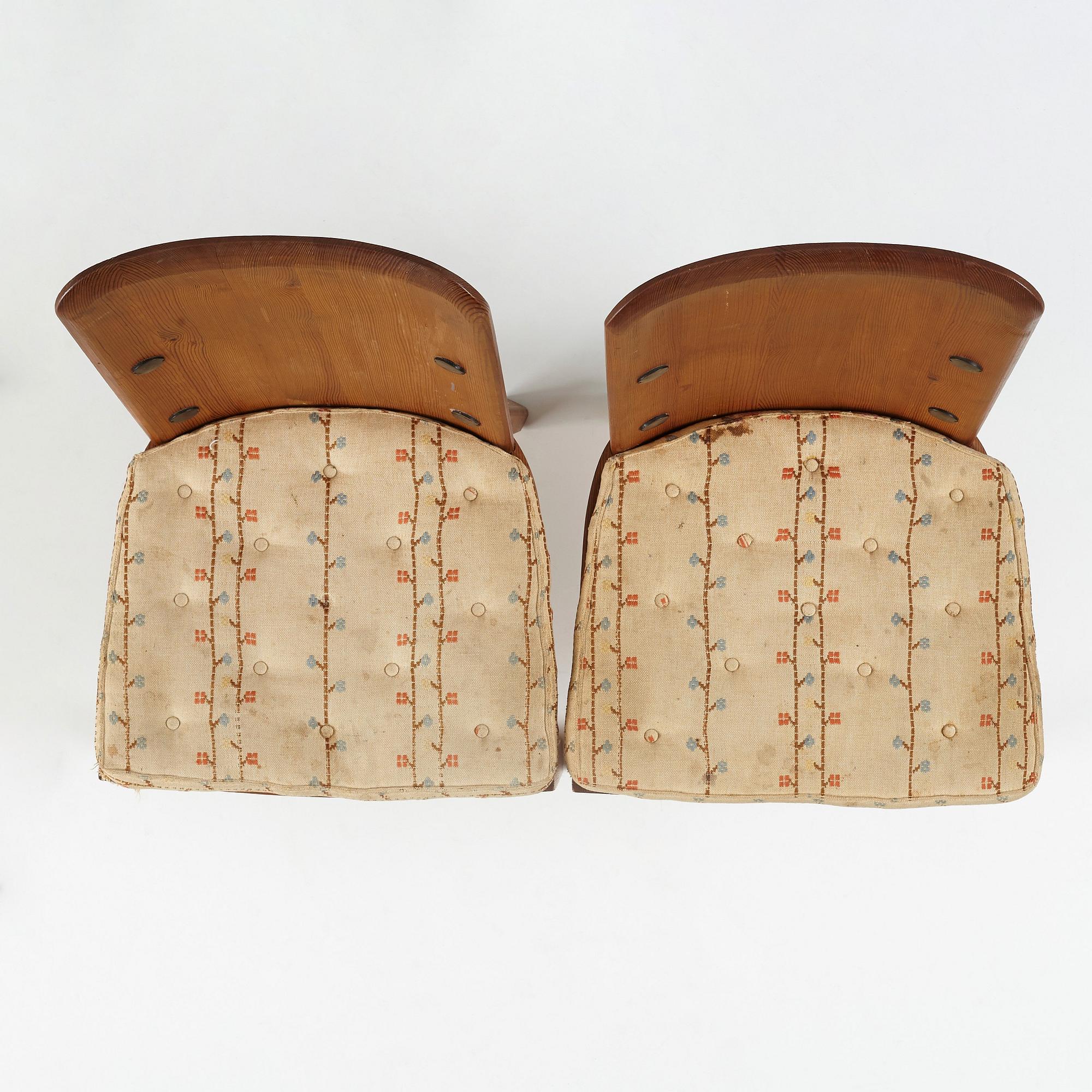 Axel Einar Hjorth, a pair of "Lovö" stained pine chairs, Nordiska Kompaniet, Sweden 1930's.