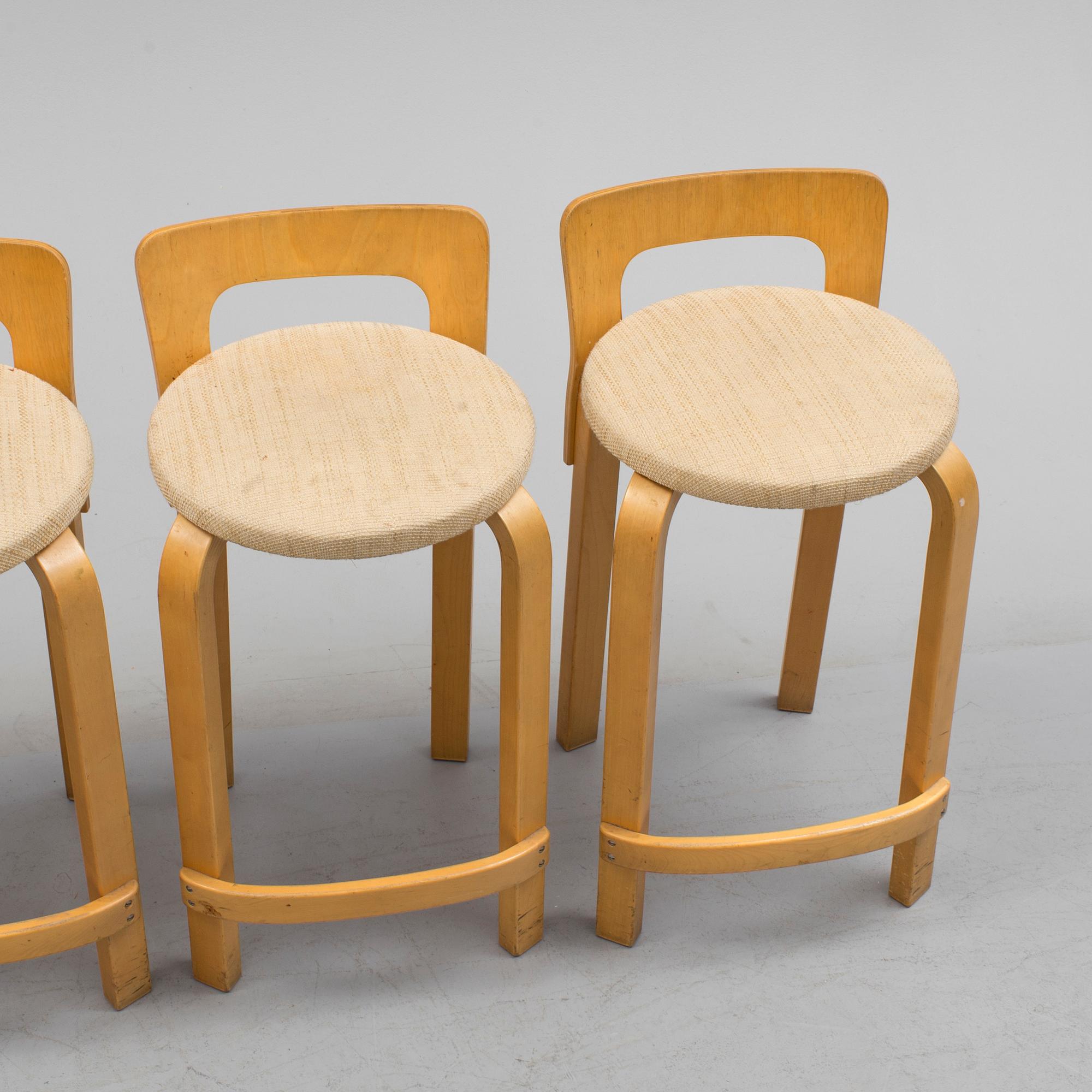 Four model K 65 bar stools by Alvar Aalto for Artek, Finland.
