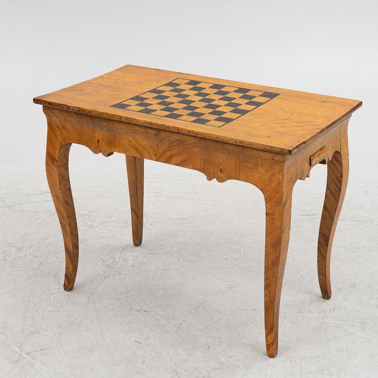 A Rococo style games table, first half of the 19th Century.