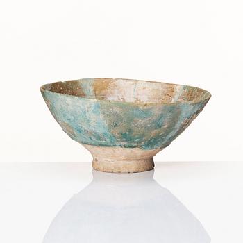 A 10-11th century Kashan Turquoise-glazed pottery bowl.