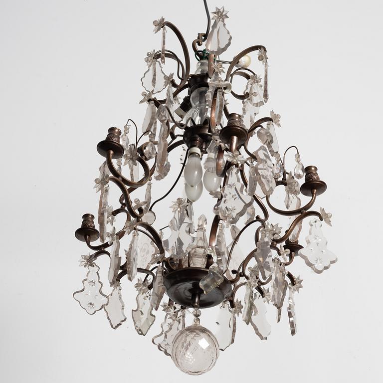 A Rococo style chandelier, early 20th century.