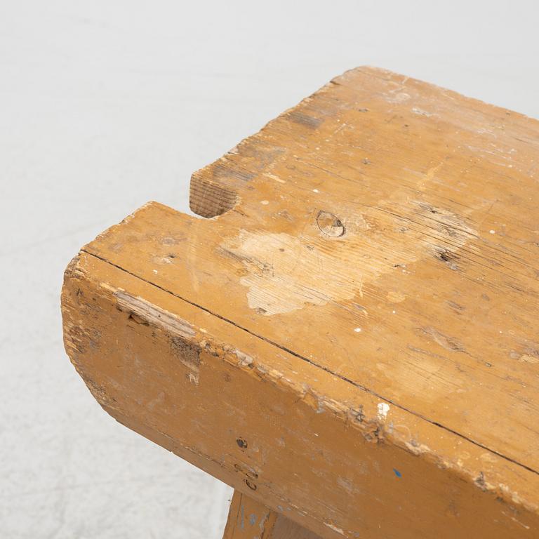 A painted bench, circa 1900.