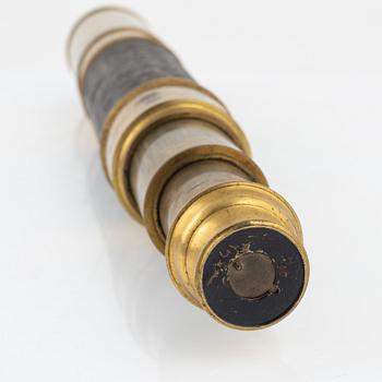 A brass telescope, around 1900.