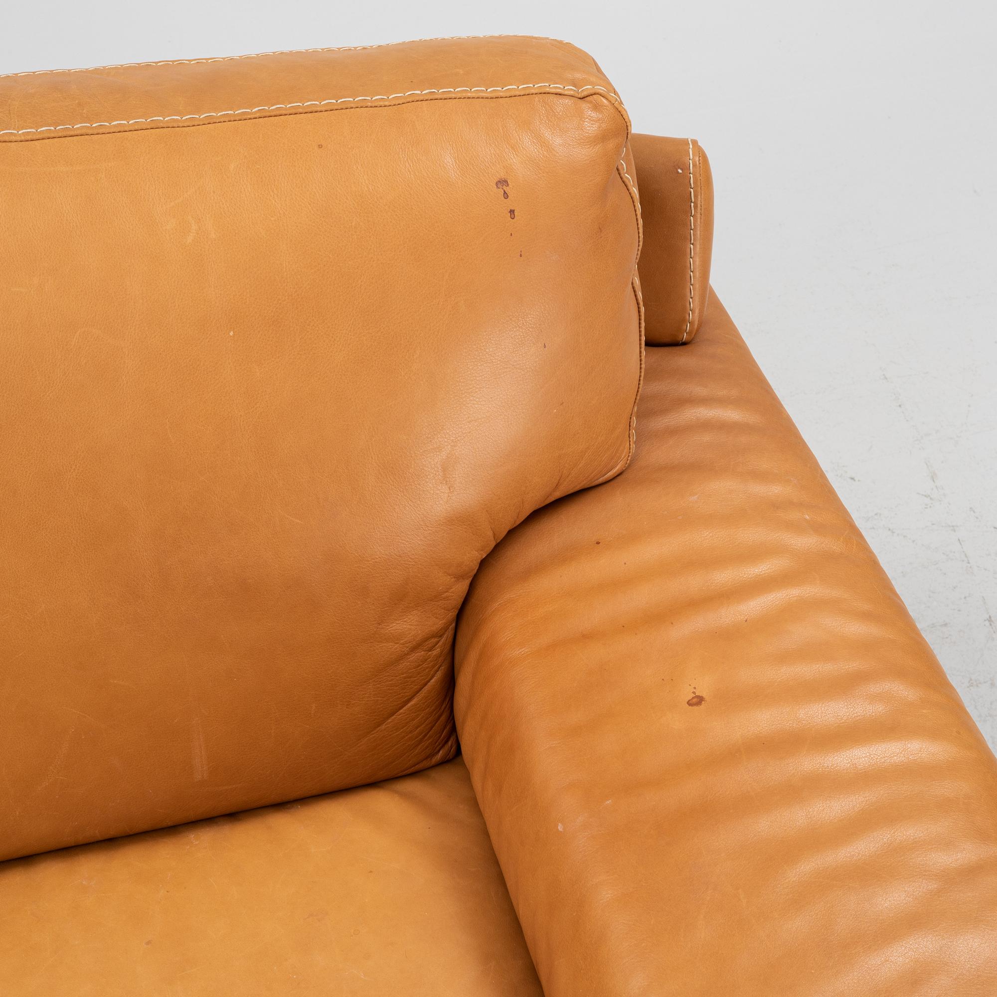 A leather upholstered sofa from Natuzzi.