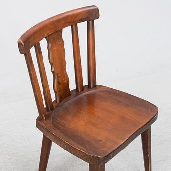 A set of four stained pine chairs from Åby Möbelfabrik, 1940s.