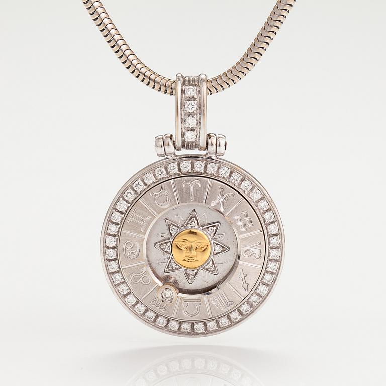 HOROSKOOPPIRIIPUS ketjulla, 14K ja 18K kultaa, timantteja n. 0.78 ct yht.