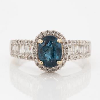 Oval faceted kyanite and diamond ring.