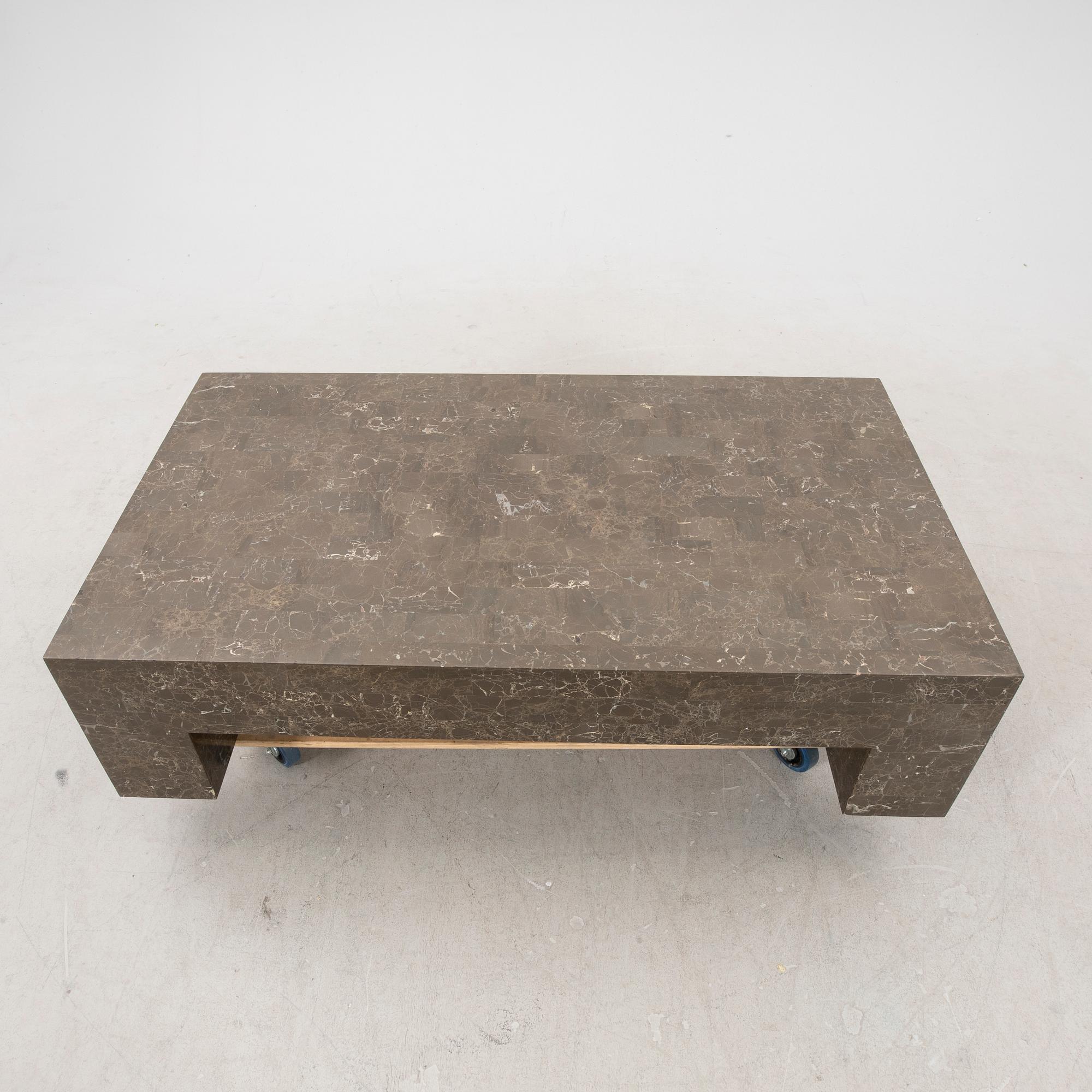 A late 20th century travertine coffee table.