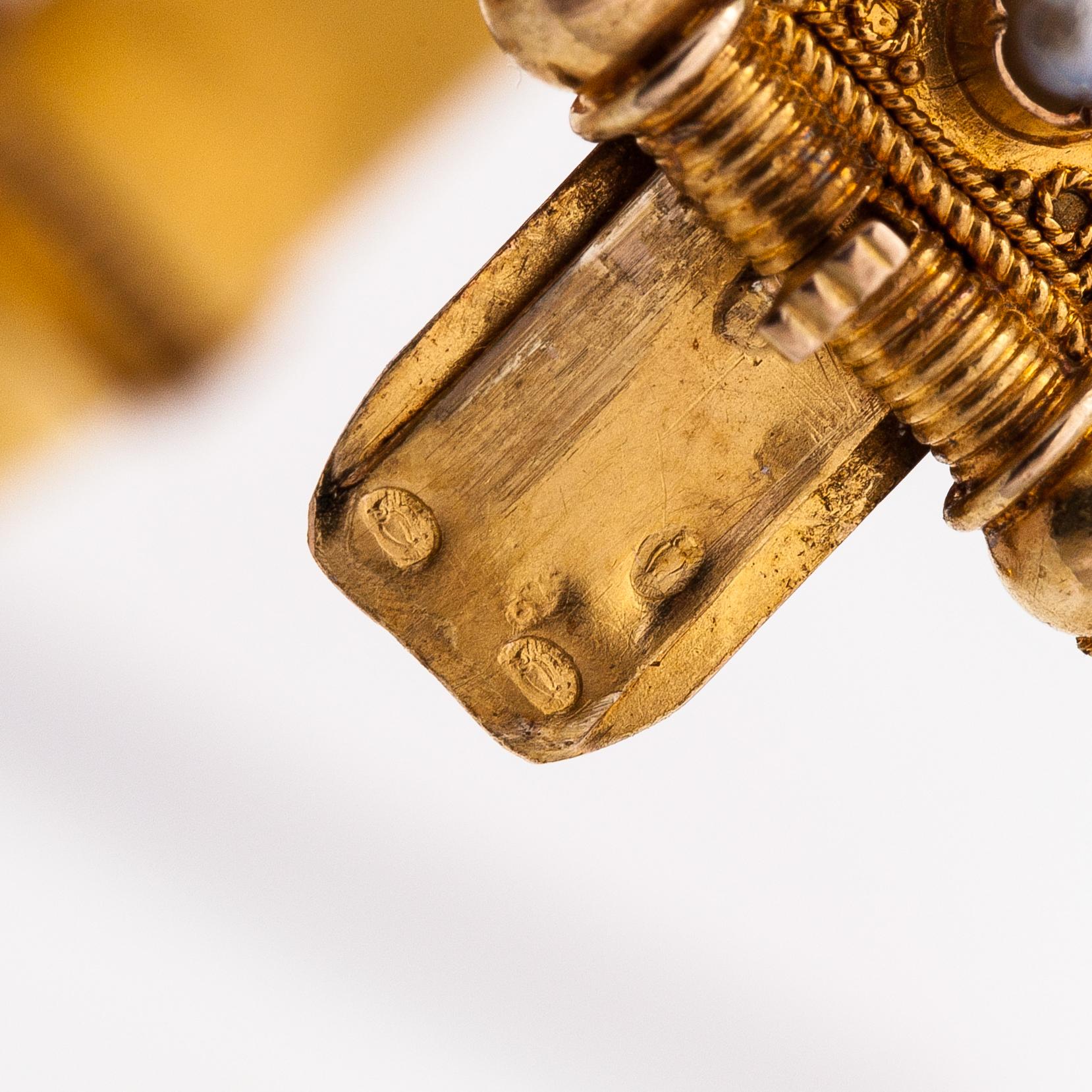 A ca. 22K gold bracelet with sapphires and pearls. Marchesini, Firenze Roma.