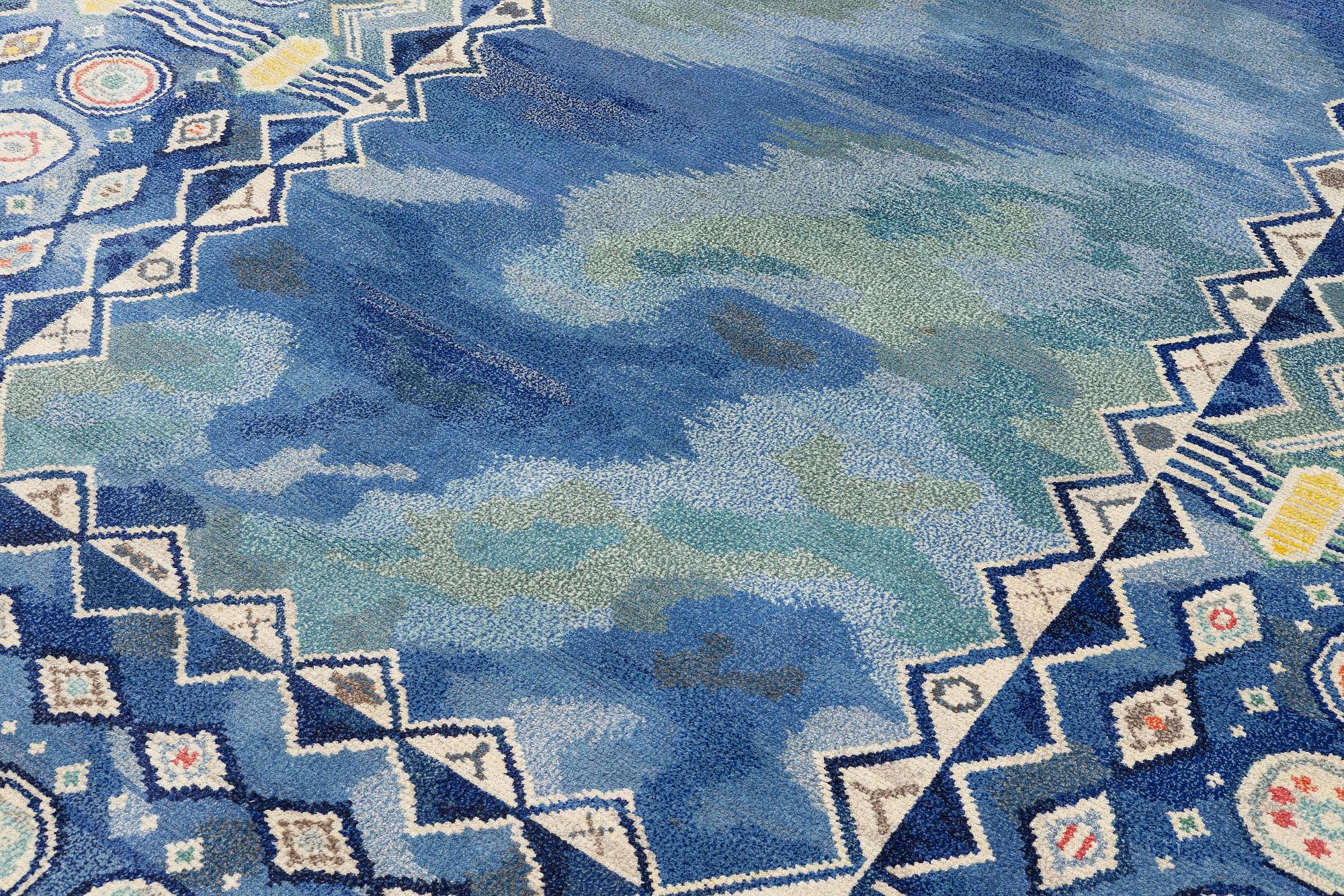 Margareta Sundbom Eichenholz, a knotted pile, 'Skogen och älven' carpet, Gävleborgs Läns Hemslöjdsförening, c. 710 x 384 cm.