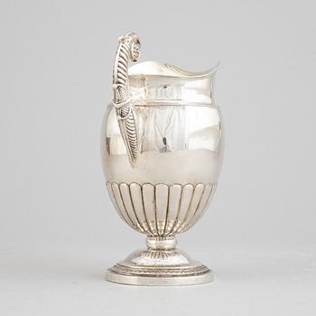 A Swedish empire parcel gilt silver creamer, mark of Anders Lundqvist, Stockholm 1828.