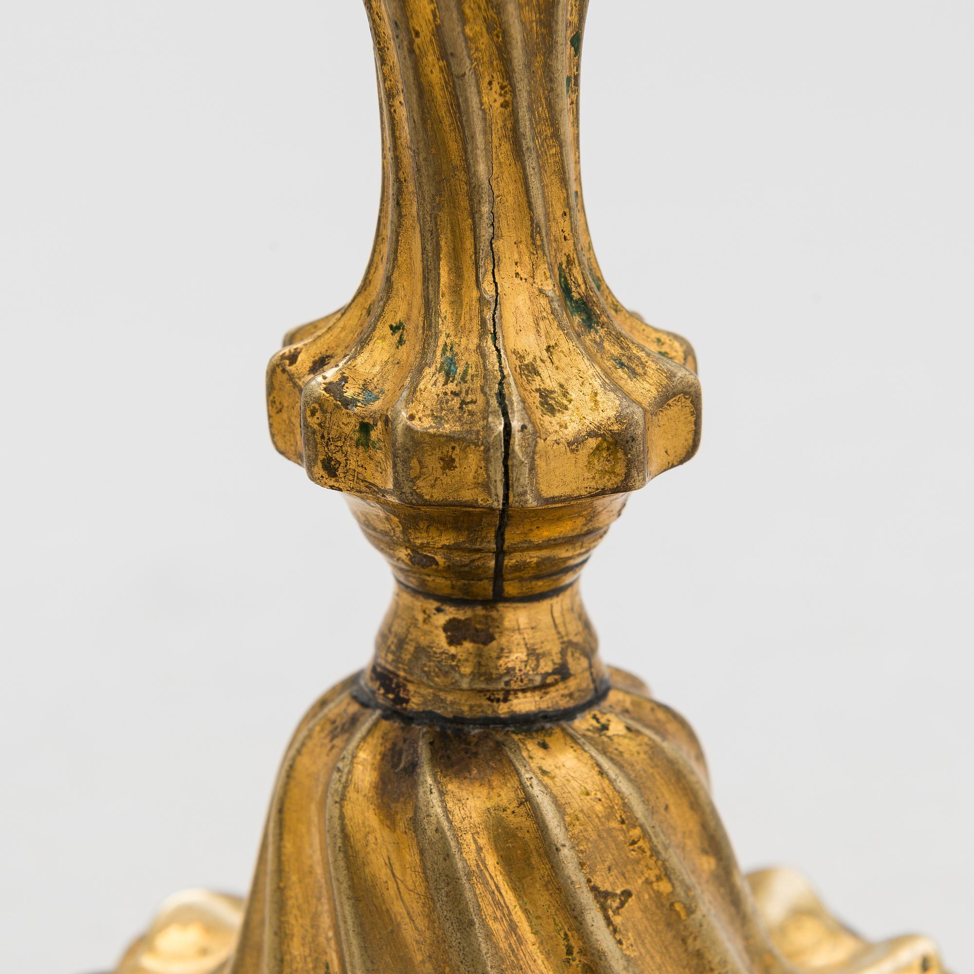 A pair of mid-18th century candlesticks France.