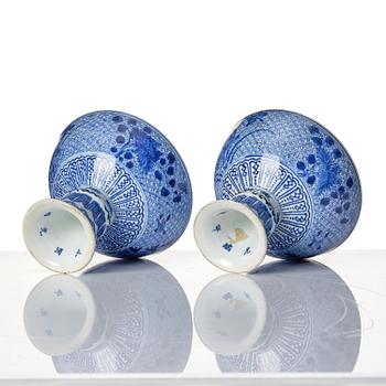 A pair of blue and white stemcups, Qing dynasty with Guangxu mark.