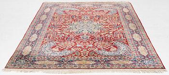 A semi-antique Kirman carpet, c. 275 x 180 cm.