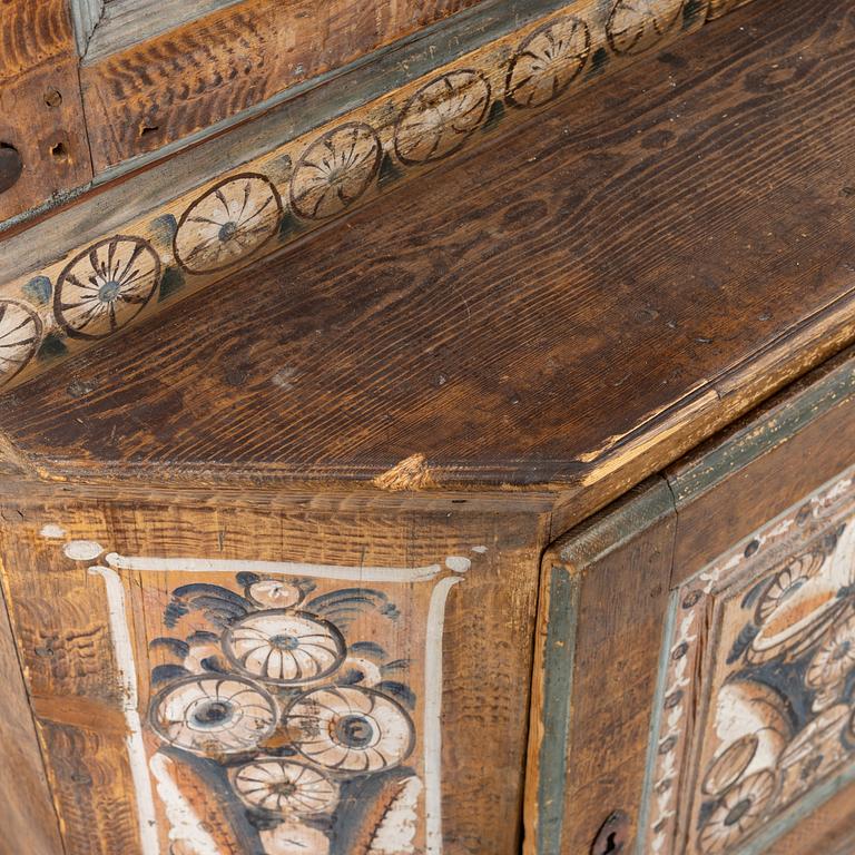 A Swedish Dalecarlian folk art cabinet dated 1808.