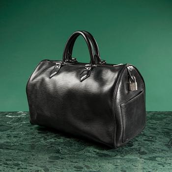 A bag "Speedy" by LOUIS VUITTON.