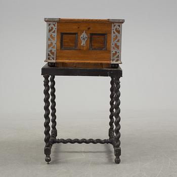 A baroque case on later stand.