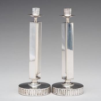 KARL WOJTECH, a pair of Swedish Grace candlesticks, 1920's-30's.