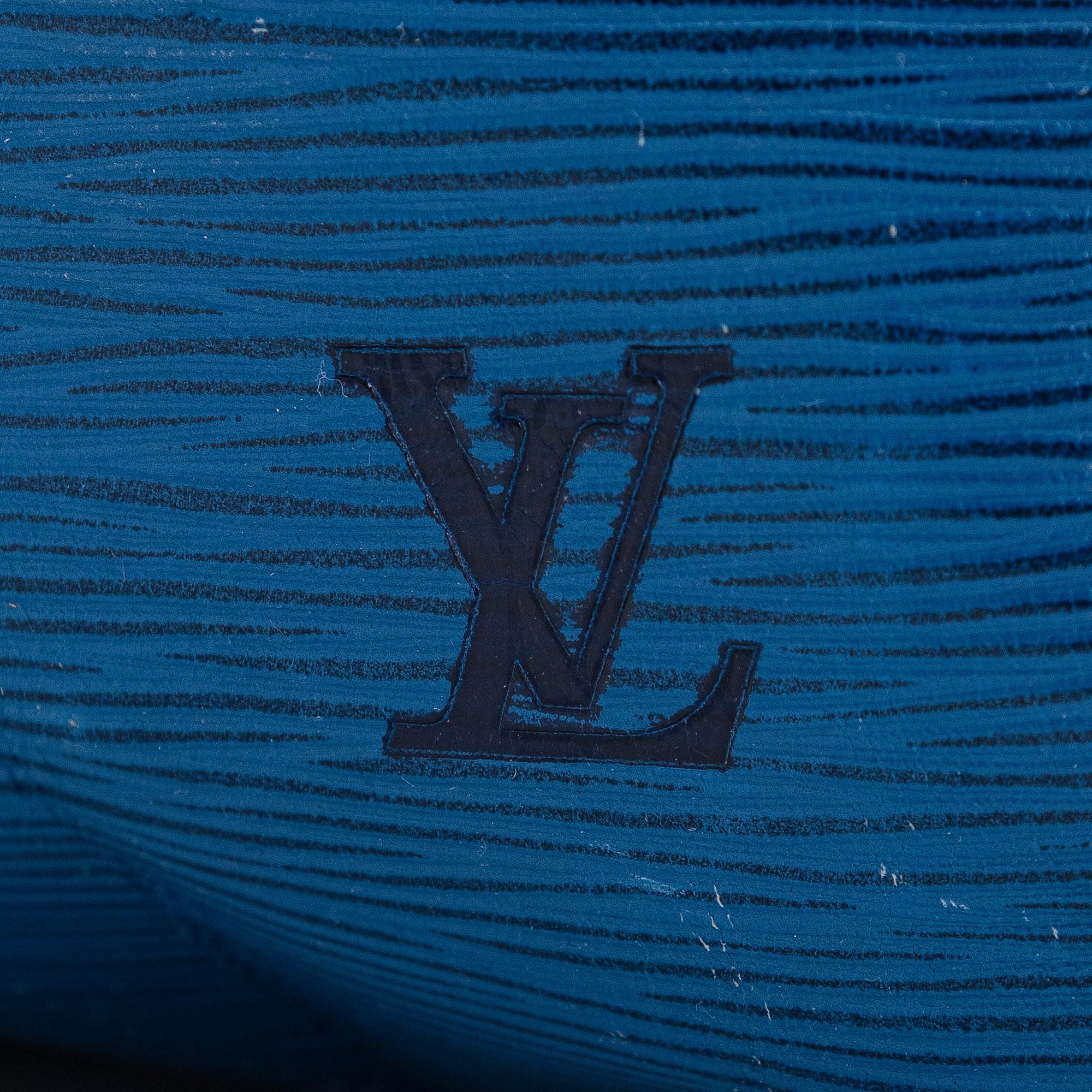 Louis Vuitton, an 'Epi Keepall 60' weekend bag.