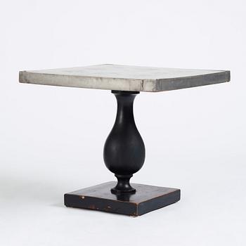 Uno Åhrén, a black lacquered table with a pewter top by Nils Fougstedt, Svenskt Tenn ca 1930. Alva & Gunnar Myrdal Collection.