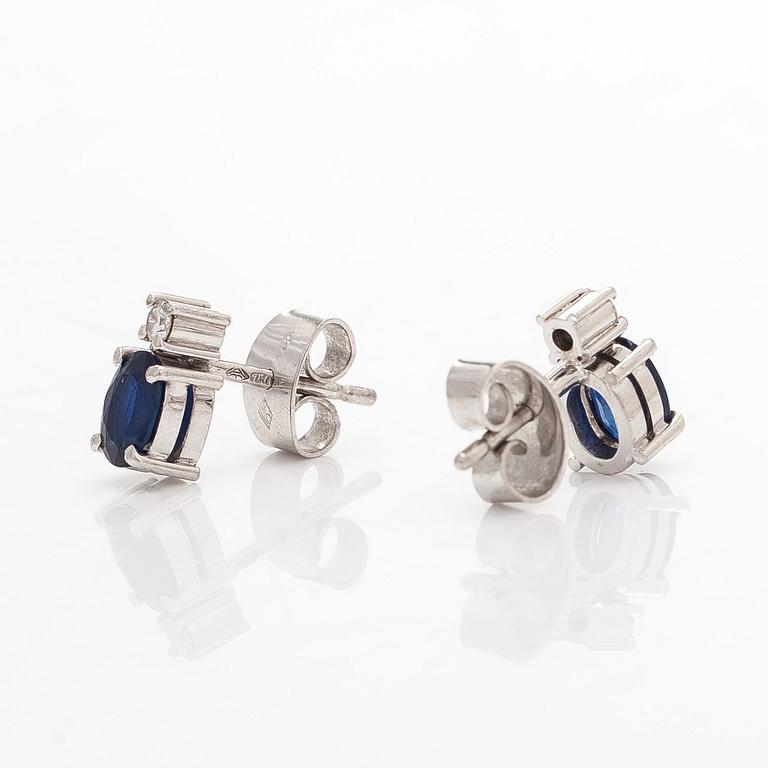 A pair of 18K white gold earrings, with oval sapphires and diamonds totalling approx. 0.06 ct. Tillander, Helsinki.