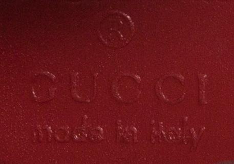 LAUKKU, Gucci.