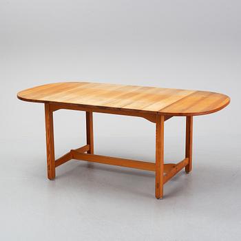 Carl Malmsten, a pine dining table and 6 chairs.
