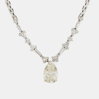 468. An 18K white gold necklace set with a pear shaped diamond weight ca 7.50 cts quality ca K/L i.