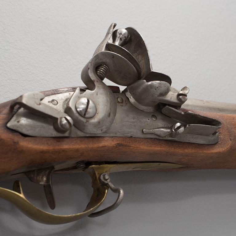 A flintlock rifle with bayonet early 19th century.