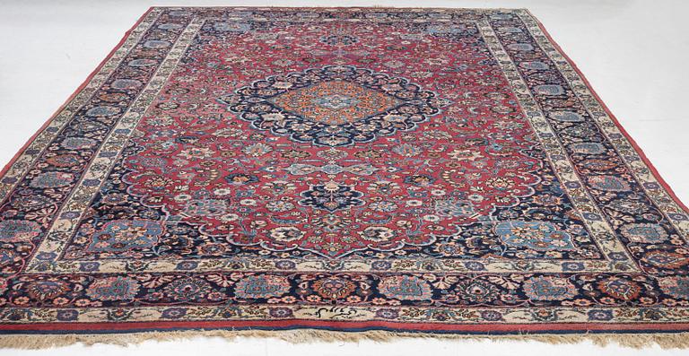 A semi-antique Mashad carpet, Eastern Iran, signed c. 507 x 303 cm.