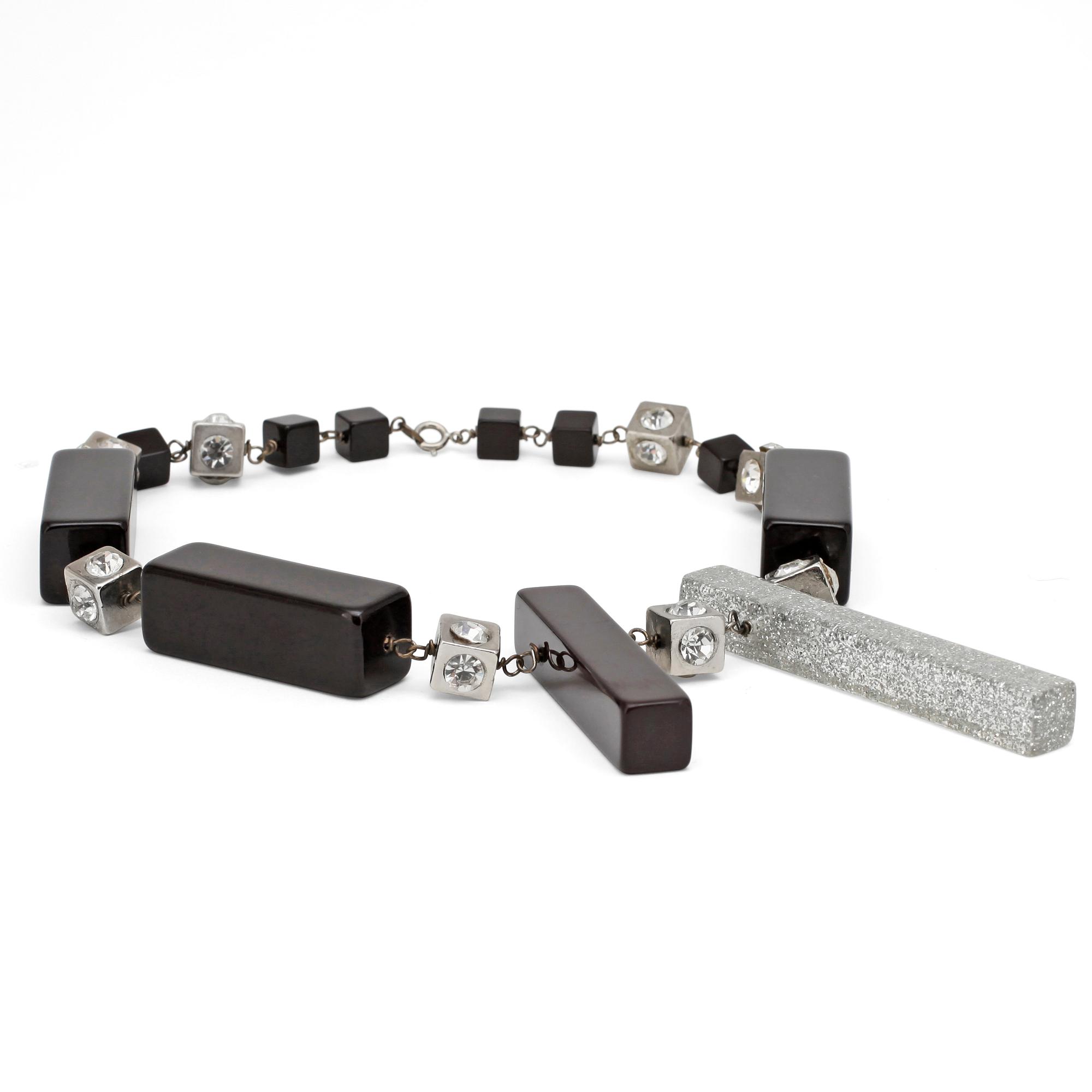 NINA RICCI, a necklace.