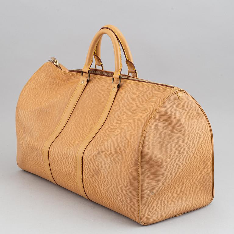 Louis Vuitton, am Epi 'Keepall 50' weekend bag.