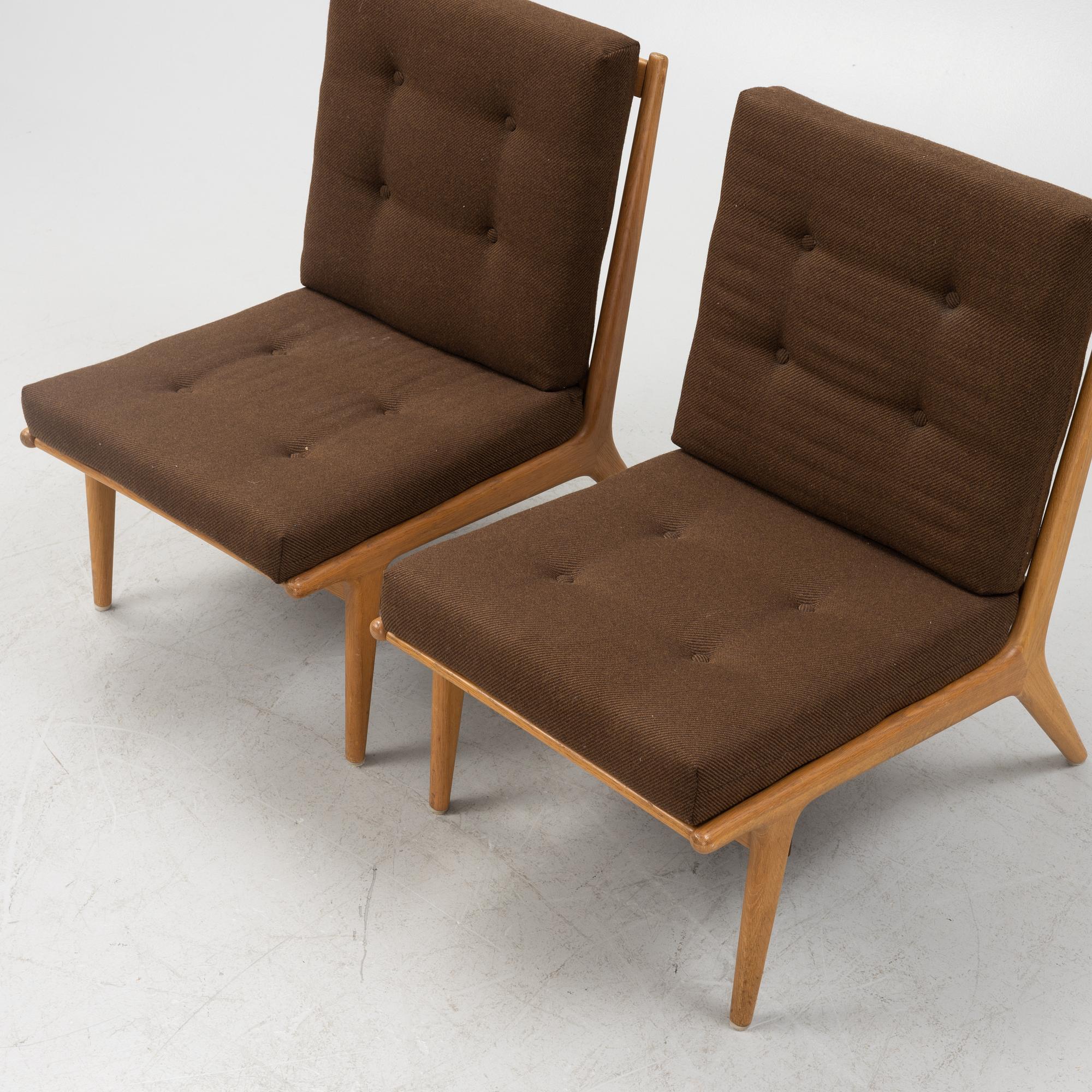 Karl Erik Ekselius, probably. A pair of oak easy chairs, JOC, Vetlanda, 1960's.