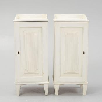 A pair of Gustavian style bedside tables, late 20th century.