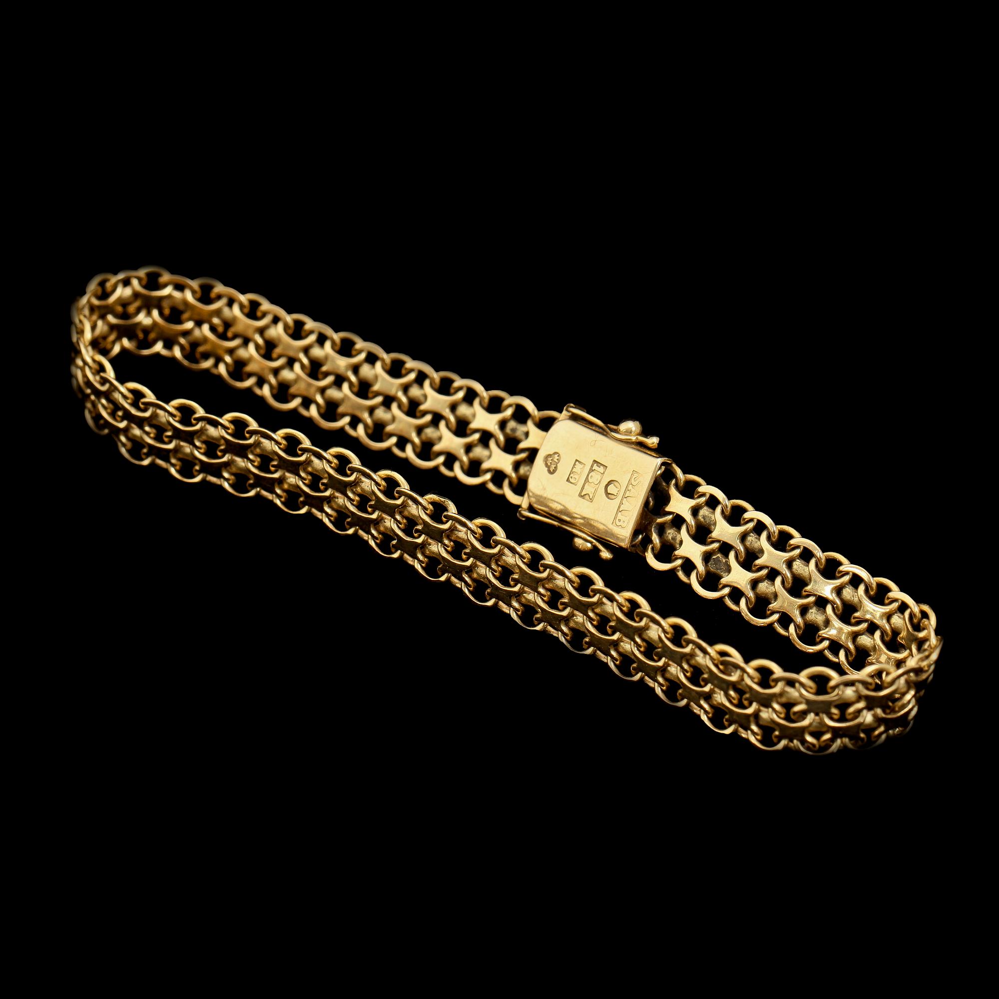 ARMLÄNK, 18 k guld, stmpl SAAB, Stockholm, 1962, vikt 17 g.