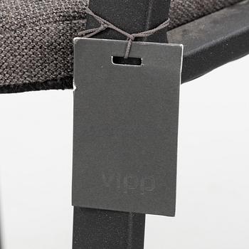 A pair of model 451 steel armchairs from Vipp.