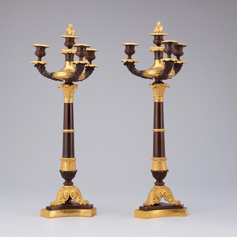 A pair of  Empire early 19th century four-light candelabra.