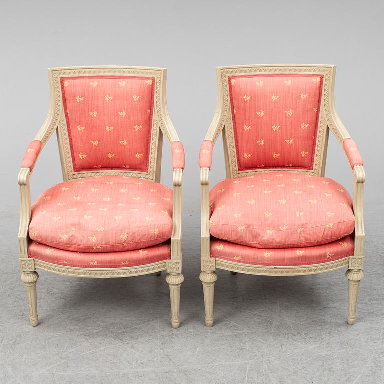 A pair of gustavian style armchairs, second half of the 20th century.
