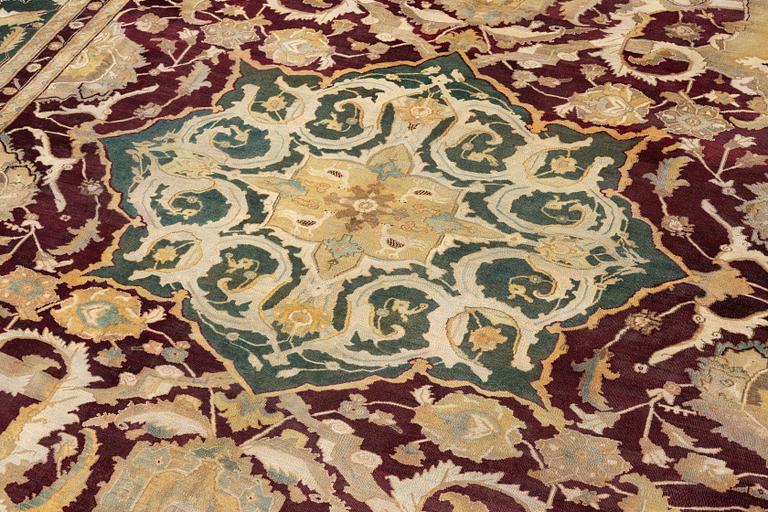 An Agra carpet, North India, c. 575 x 404 cm.