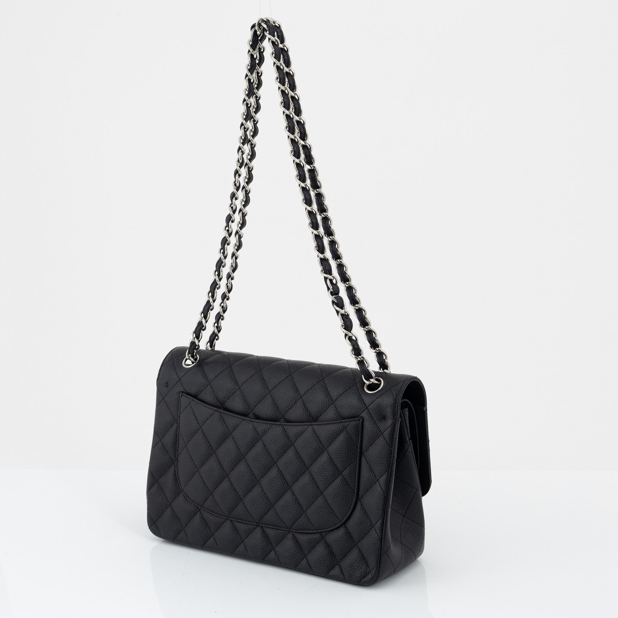 Chanel, a black caviar leather 'Double Flap Bag', 2013-14.