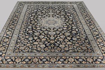 A carpet, Kashan, ca 405 x 295 cm.