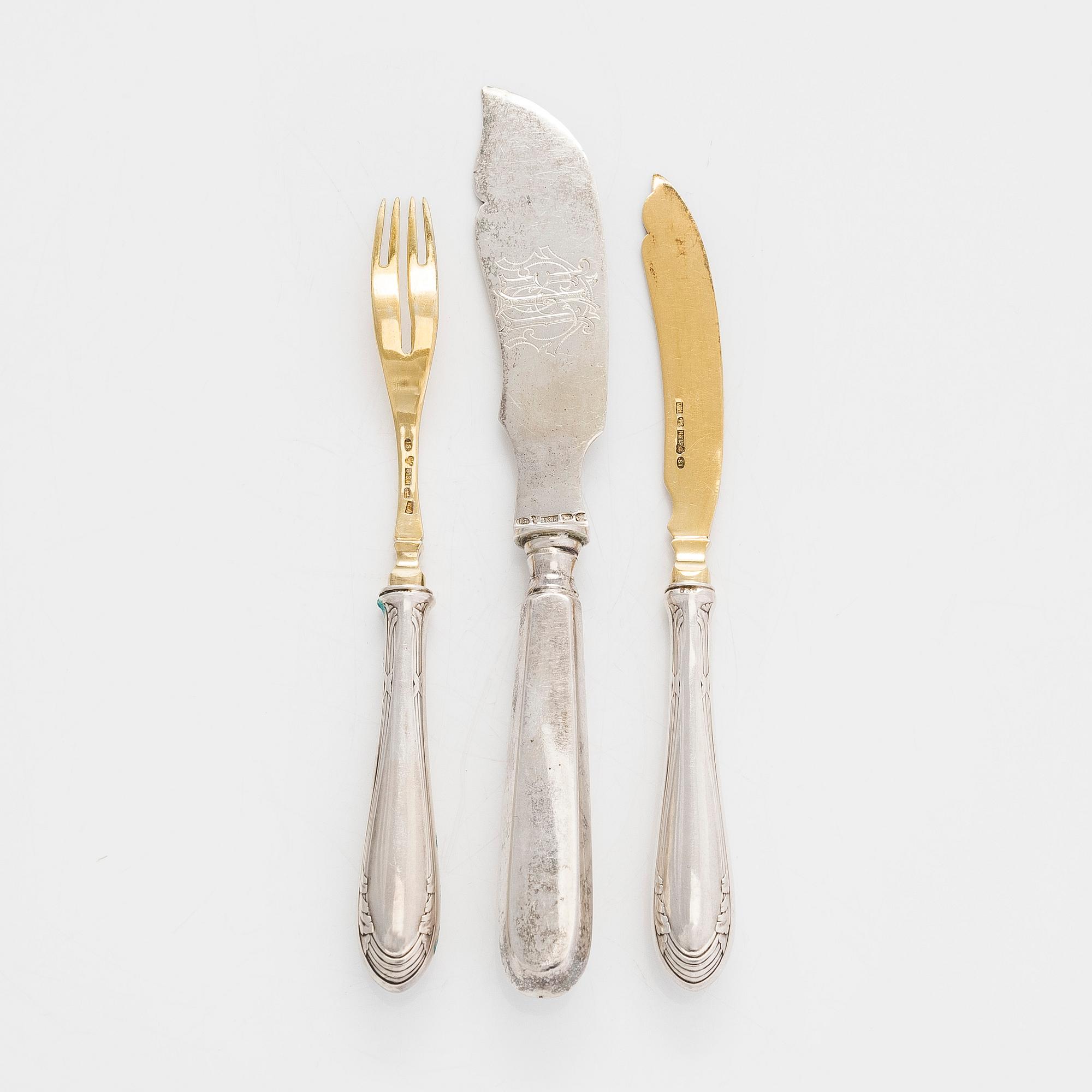A 12-piece set of parcel-gilt fruit cutlery, and a silver butter knife, maker's mark Iisakki Saha, Pori 1898-1899.