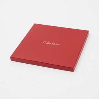 Cartier, a satin silk scarf.