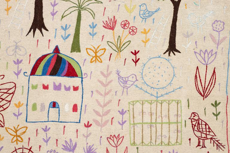 A hand-embroidered Kelim rug, 186 x 123 cm.