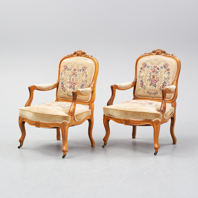 A set of sofa, two armchairs and six chairs, Louis XV-style, ca 1900.
