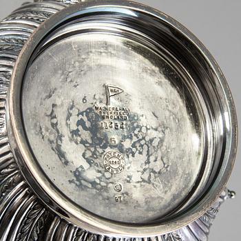 A 20th century tea pot on stand by Walker & Hall, Sheffield, England.