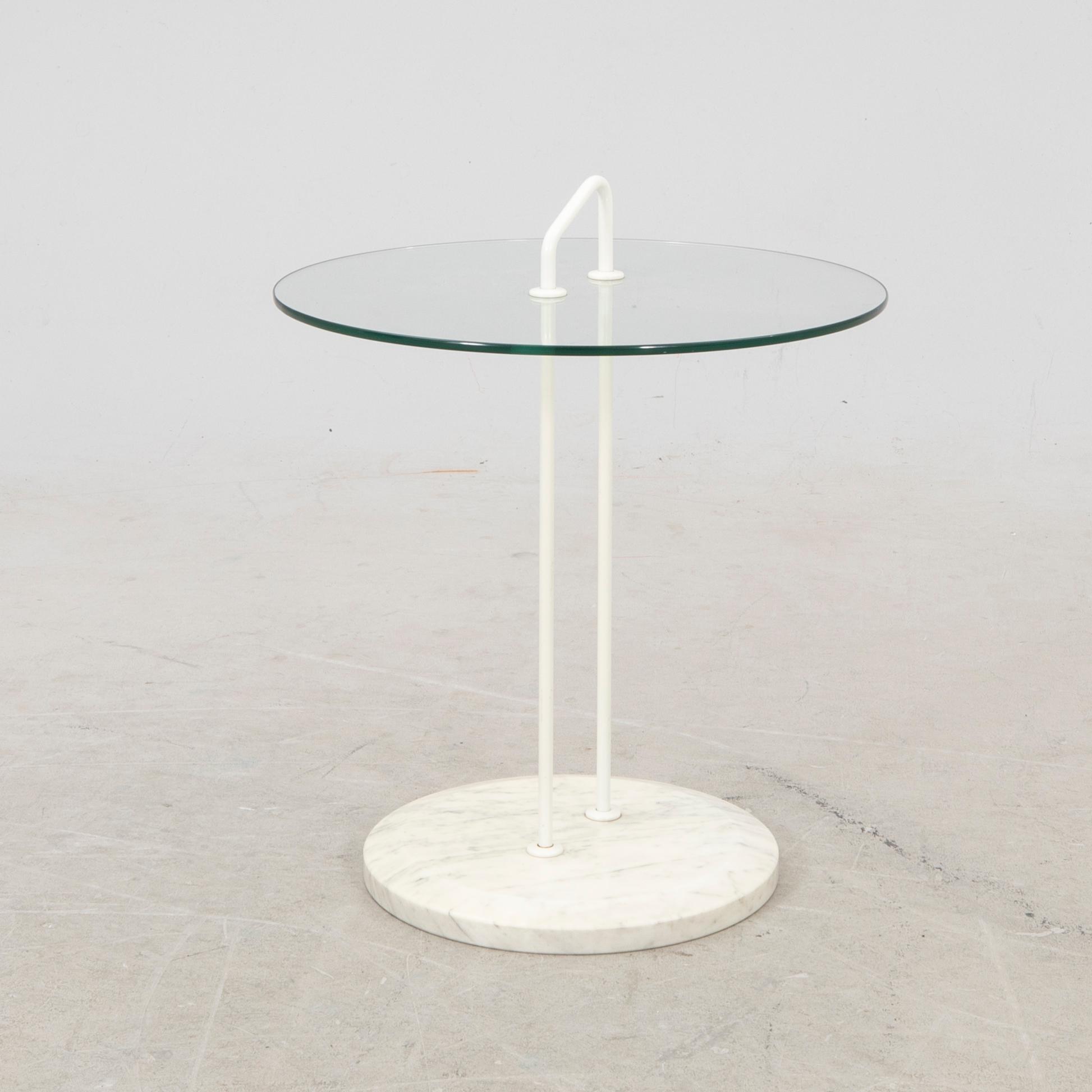 A late 20th century marble and glass side table.