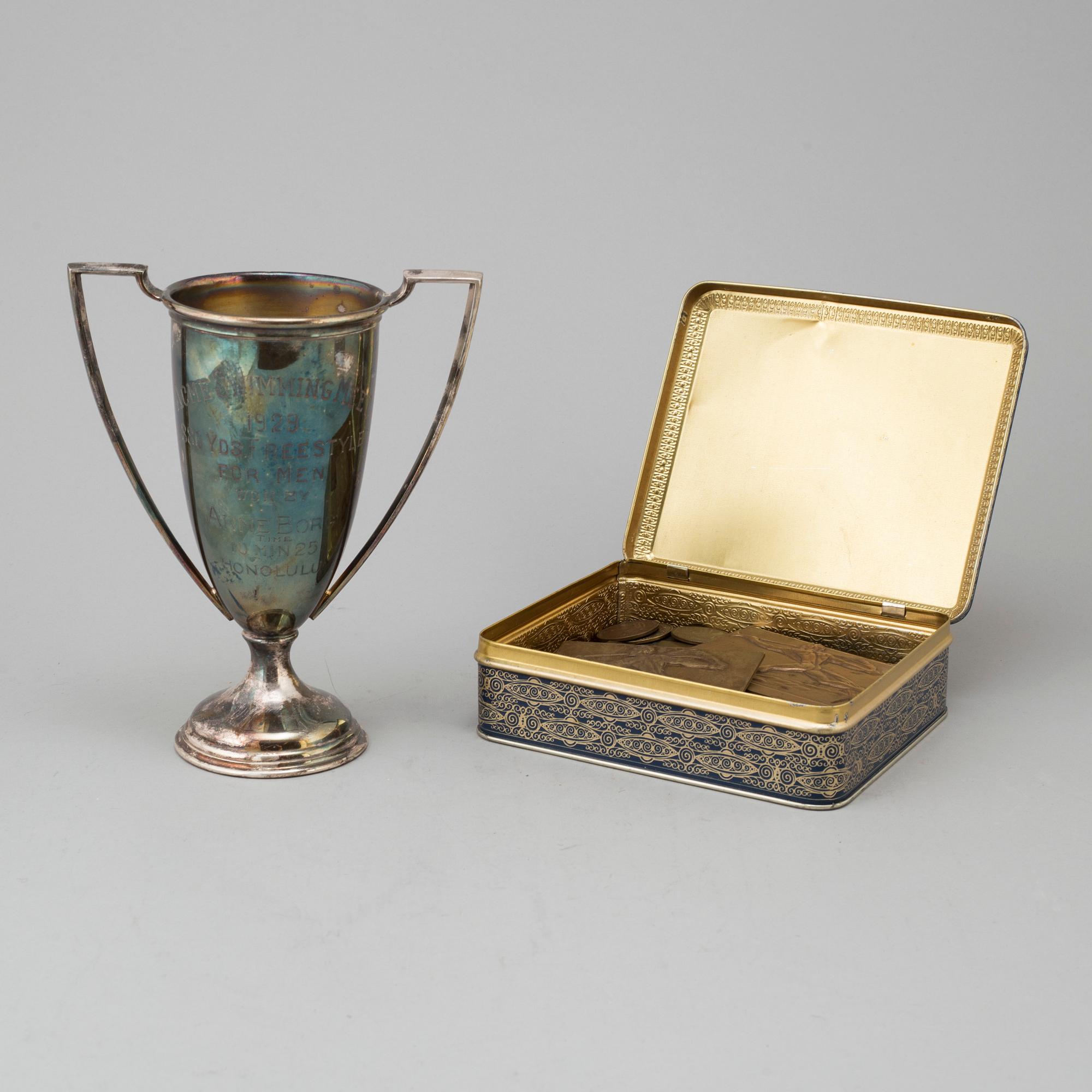 Swedish olympic champion swimmer Arne Borgs victory trophy and medals.