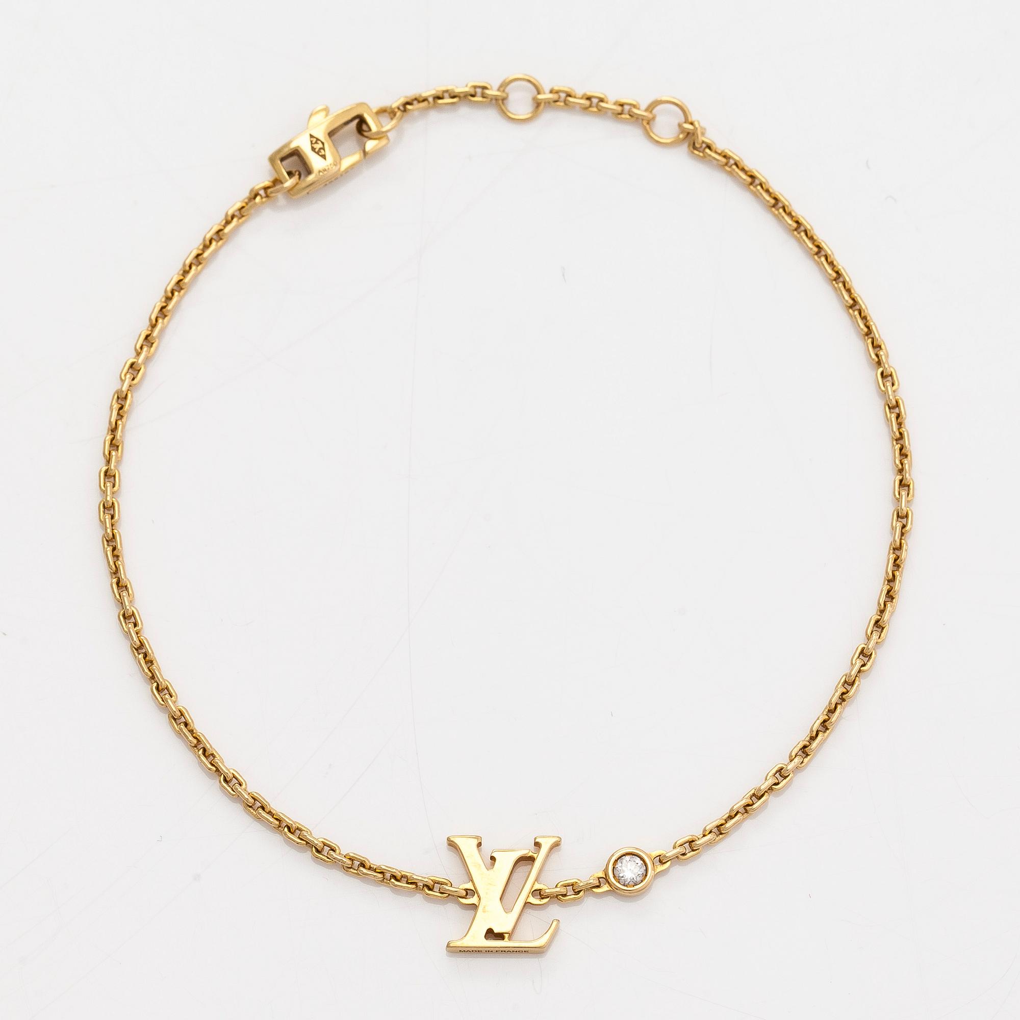 Louis Vuitton, an 18K gold 'Idylle Blossom LV' bracelet with a diamond.