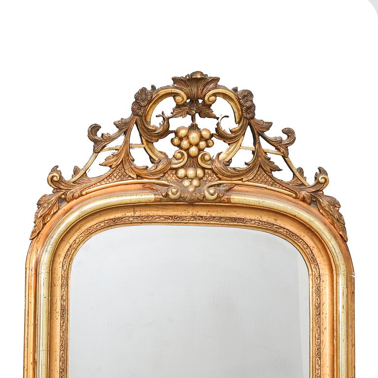 A late 19th century gilded Neo Rococo mirror.